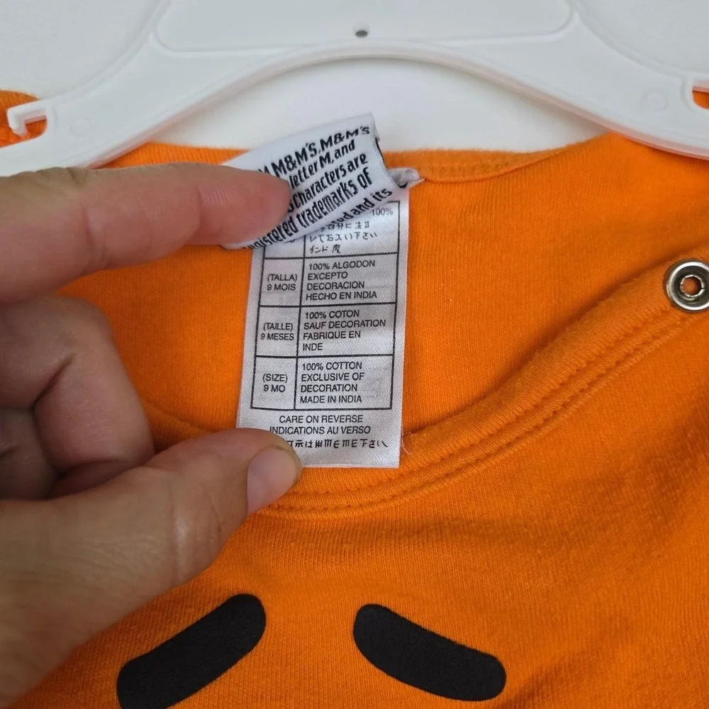 M&M's World orange baby onesie Size 9 months